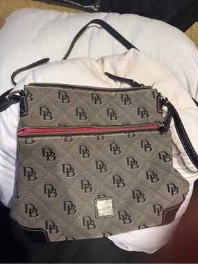 Dooney & Bourke Taupe Monogram Crossbody with Black Trim and Red Zip